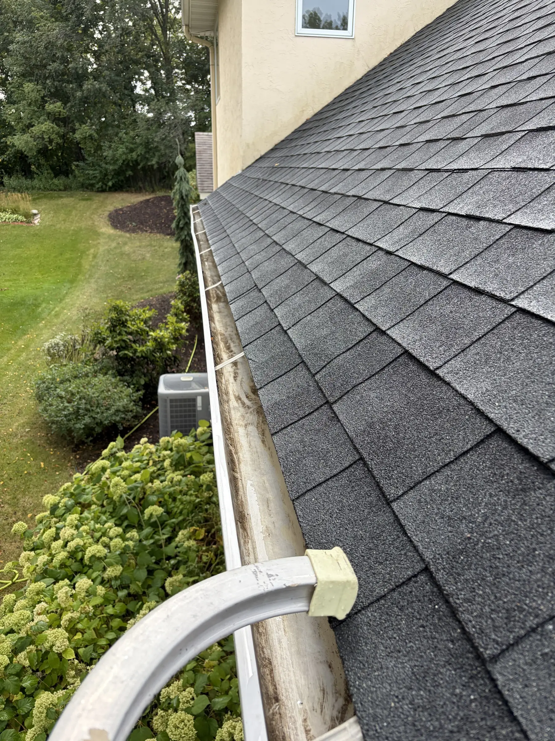 After: the same gutter cleared of debris
