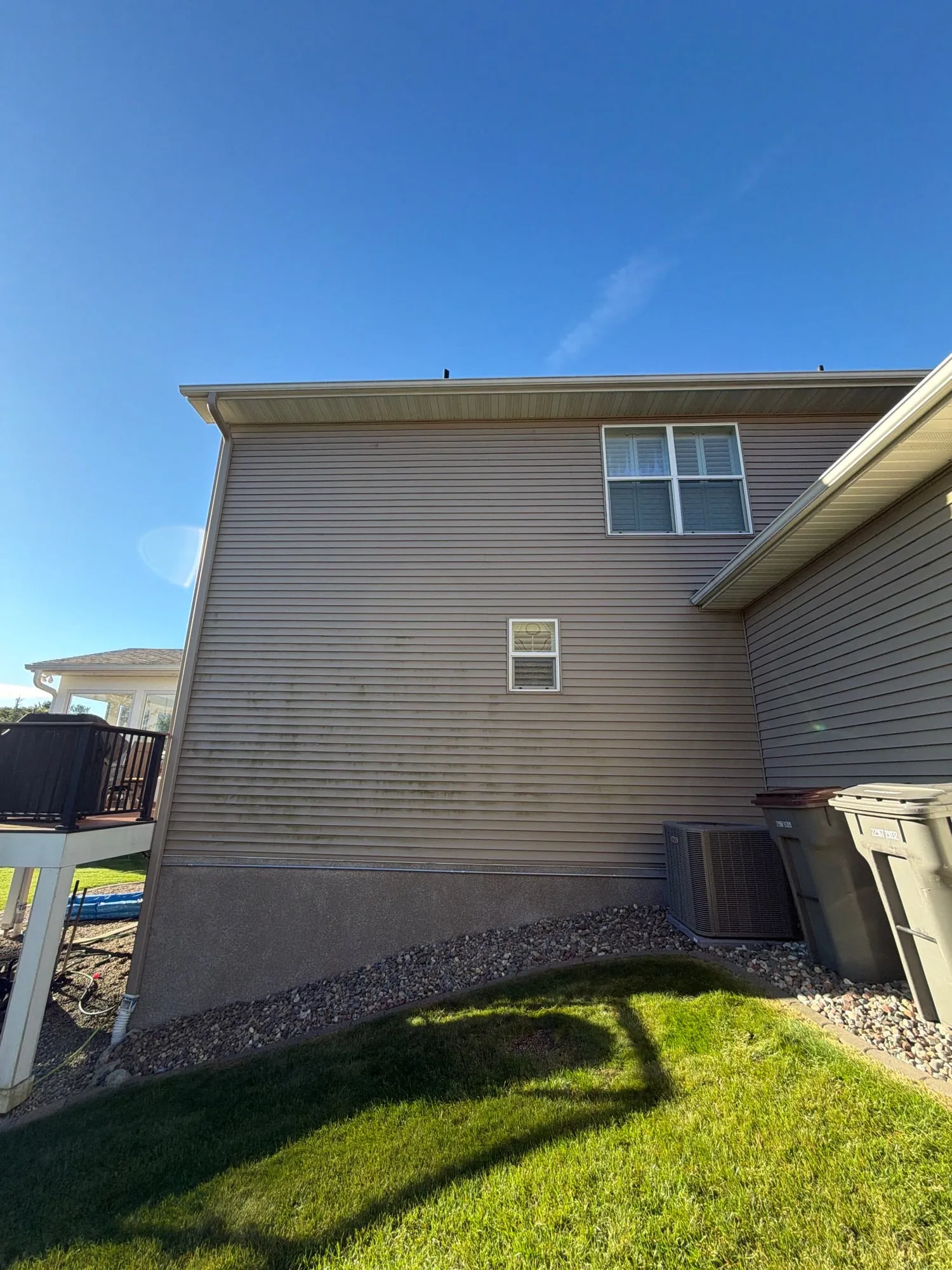 Side of a house before washing