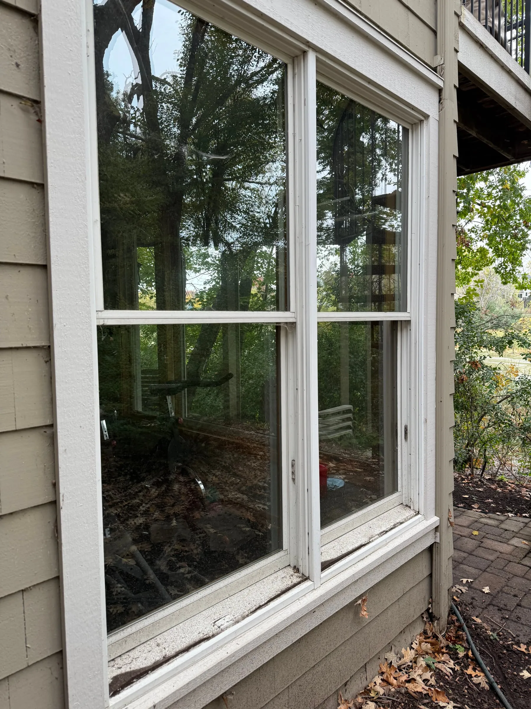 Dirty window and sill before cleaning