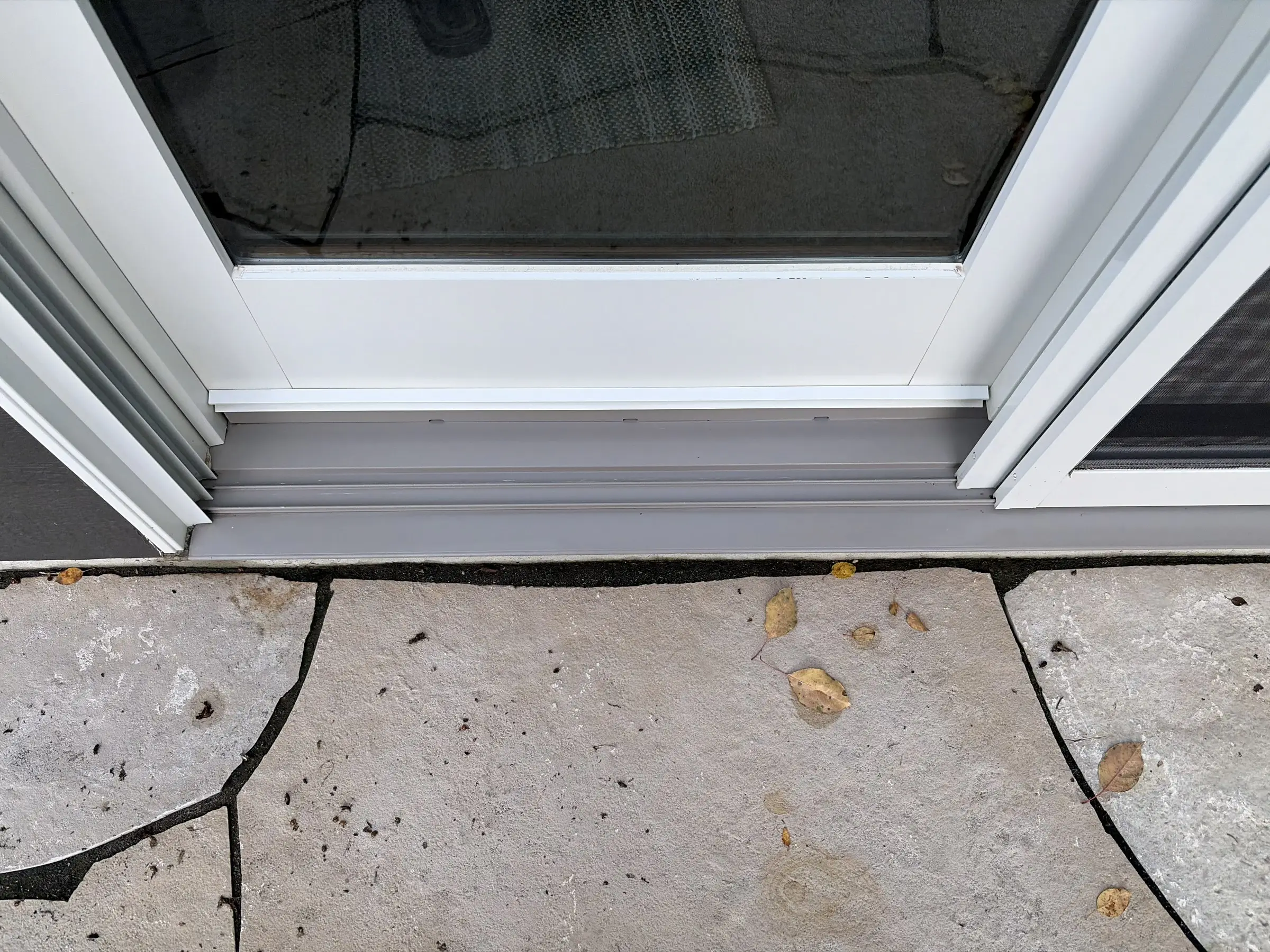 After: the same door track wiped clean